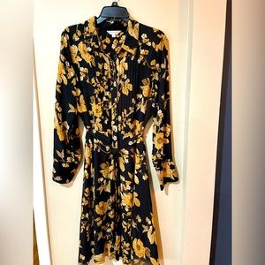 Nanette Lepore size 12 black and gold dress. Lightweight material.